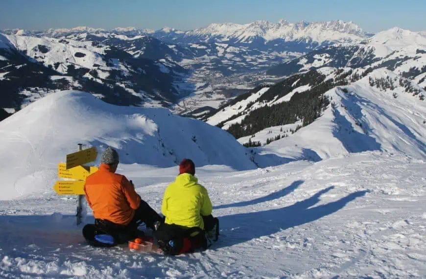 Tourists winter mountain hiking