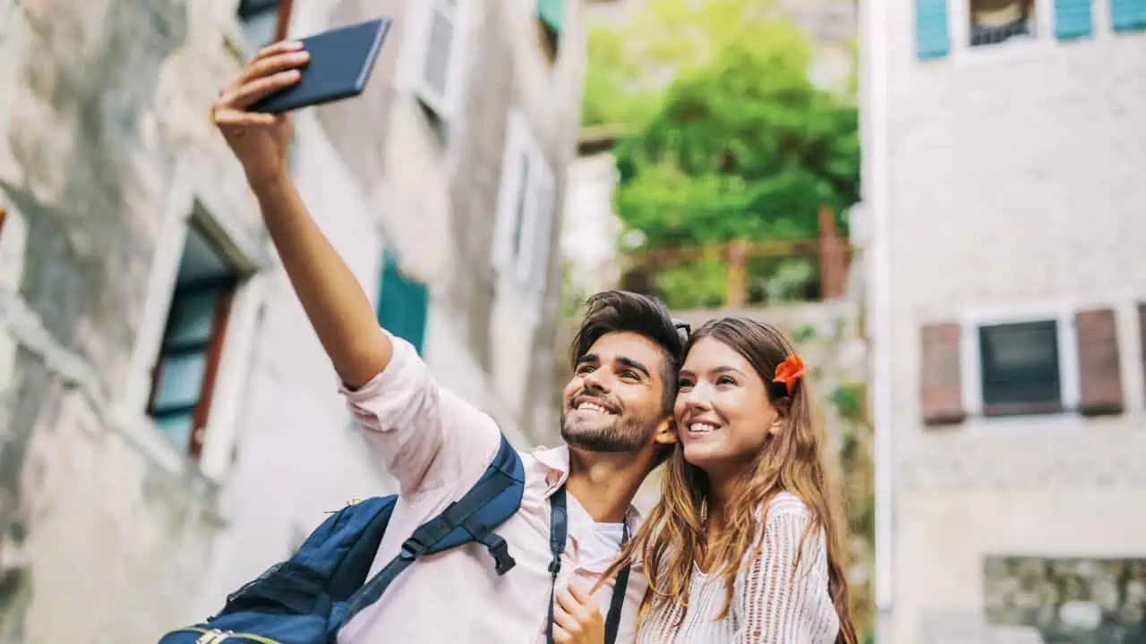 couple traveling selfie