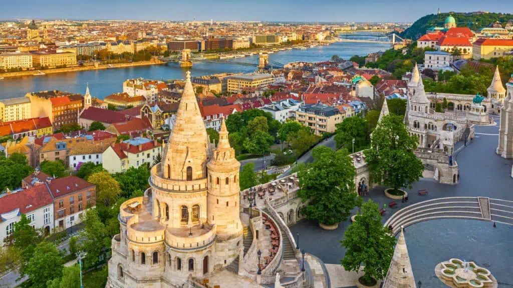 Fisherman's Bastion at sunset with Szechenyi Chain Bridge in Budapest, Hungary