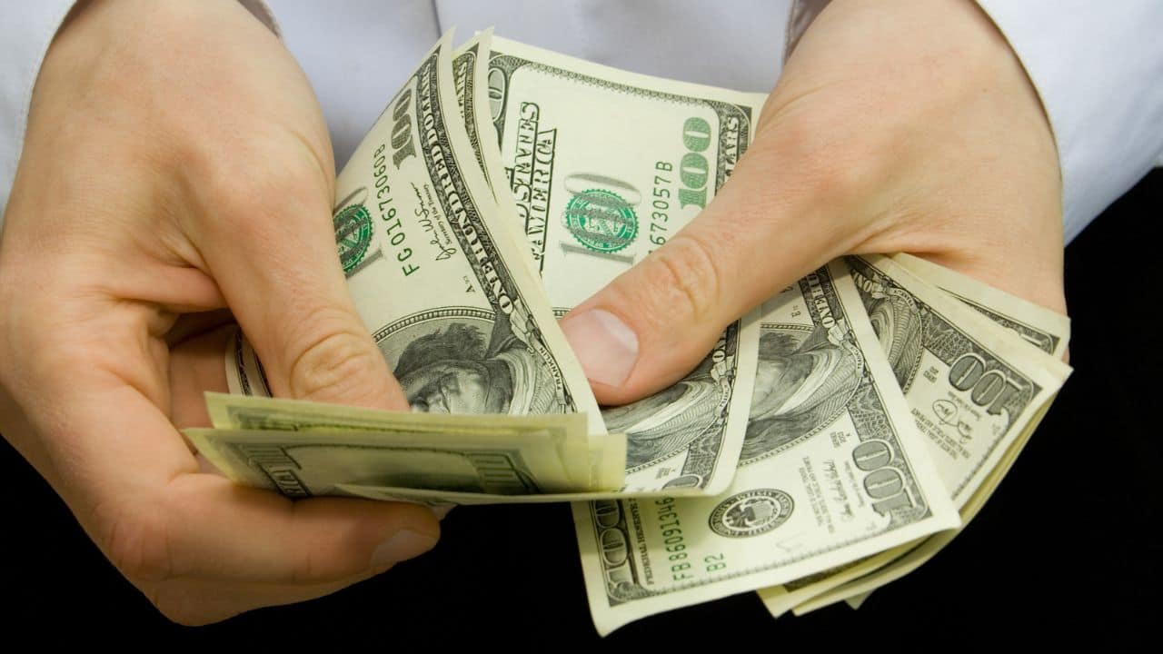 holding money